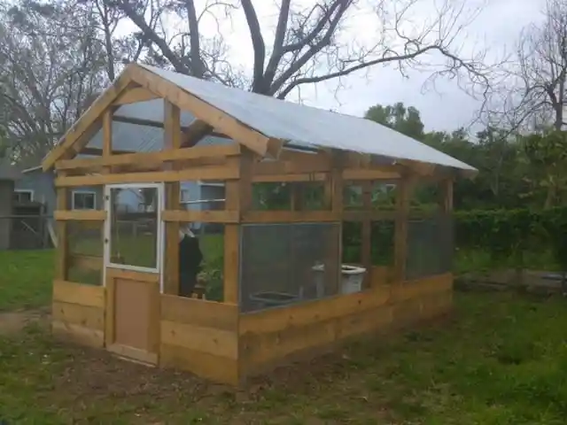 A Greenhouse Made From Wooden Crates