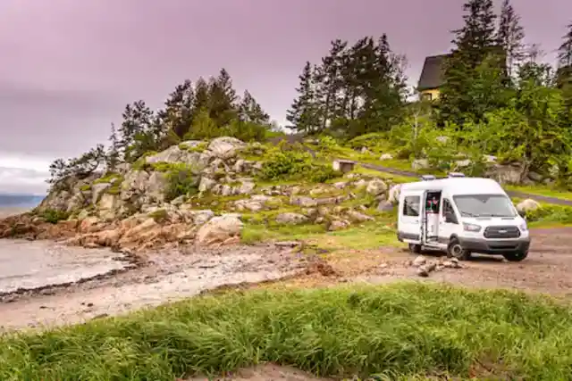 VAN IN THE BEACH