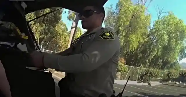 Officer Opens Woman’s Trunk Unaware He’s Being Recorded