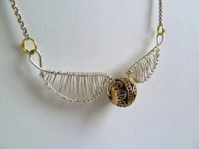 10. Golden Snitch Necklace