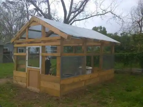 A Greenhouse Made From Wooden Crates