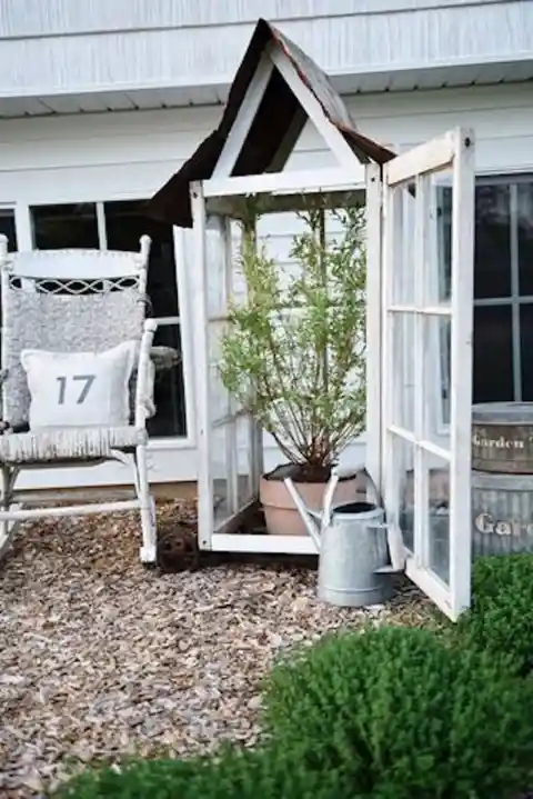 A Greenhouse Made From Upcycled Windows