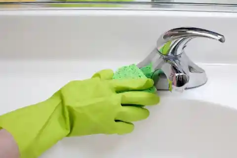 Scrubbing Baby Oil On Chrome Faucets