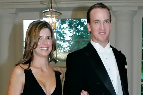 Peyton Manning and Ashley Thompson