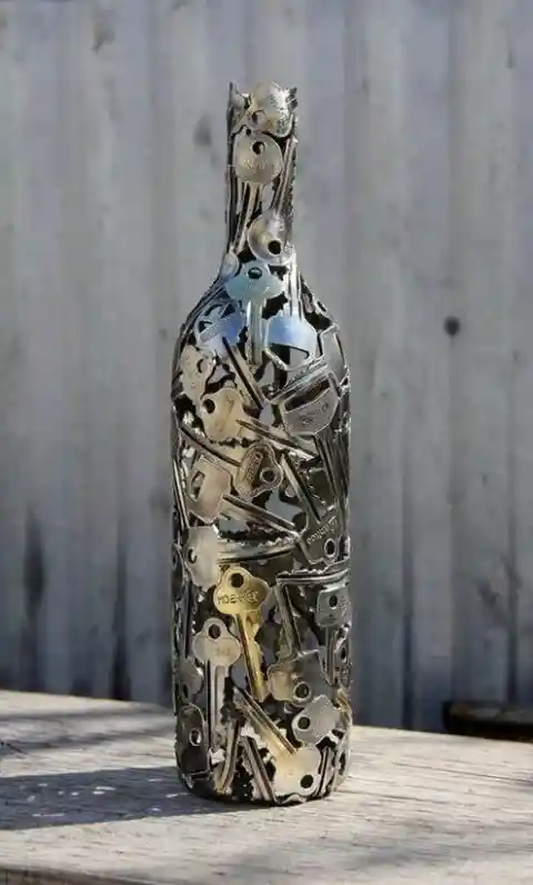 16. Glass & Metal Sculpture