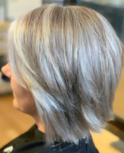 Medium Gray Hairstyle with Swoopy Layers