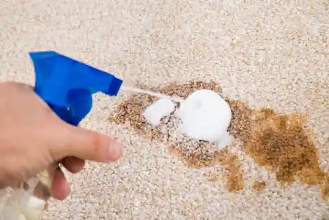 Coarse Salt And Lemon On Wooden Chopping Board